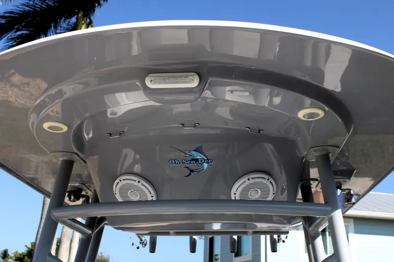 Slide: The Image of 2020 Release 240 RX boat with speakers and logo, viewed from below. - 24