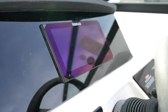 Slide: The Image of Dashboard of 2025 Sea Ray SPX 230 boat with Simrad display. - 15