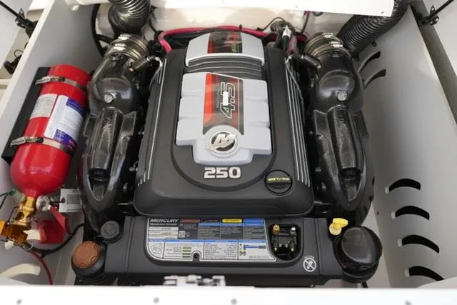 Slide: The Image of Engine compartment of 2025 Sea Ray SPX 230 with Mercury 250 HP engine. - 16