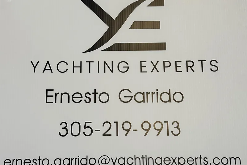 Slide: The Image of Yachting Experts contact sign with email and phone number for inquiries. - 20