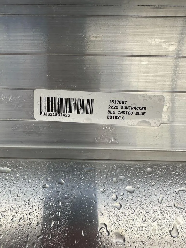 Slide: The Image of 2025 Sun Tracker Bass Buggy 16 XL Select label with barcode and water droplets. - 3
