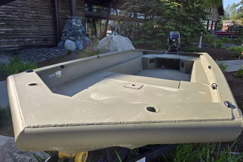 Slide: The Image of 2025 Tracker Grizzly 1650 T Prairie Wings Edition boat in outdoor setting. - 3