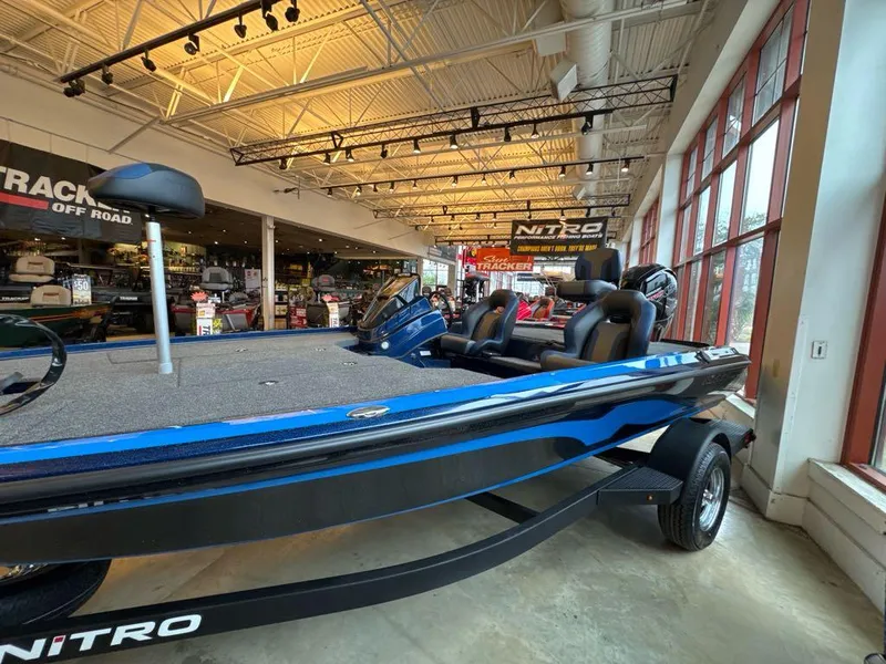 The Image of 2025 Nitro Z18 boat displayed in a showroom with modern interior and sleek design. - 0