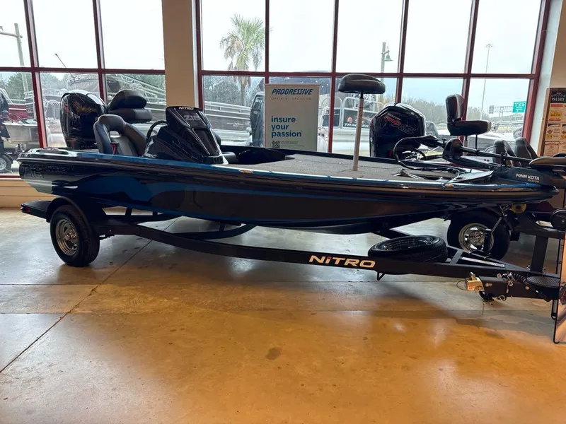Slide: The Image of 2025 Nitro Z18 boat displayed indoors on a trailer. - 2