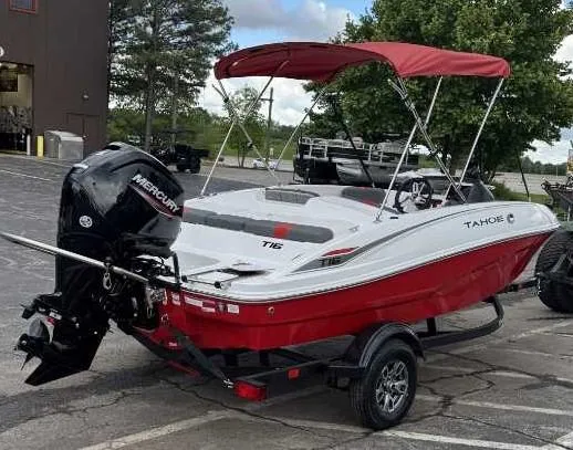 Slide: The Image of 2025 Tahoe T16 boat with red canopy and Mercury outboard motor. - 4