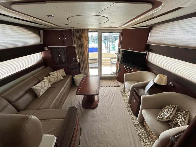 Slide: The Image of Luxurious 2013 Meridian 441 yacht interior with elegant seating and modern amenities. - 11