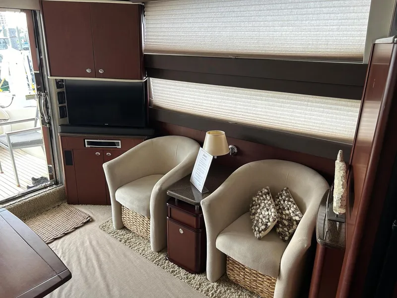 Slide: The Image of Luxurious 2013 Meridian 441 yacht interior with cozy seating and modern decor. - 12