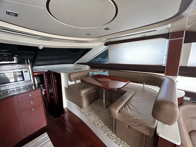 Slide: The Image of Luxurious interior of a 2013 Meridian 441 yacht with elegant seating and modern design. - 17