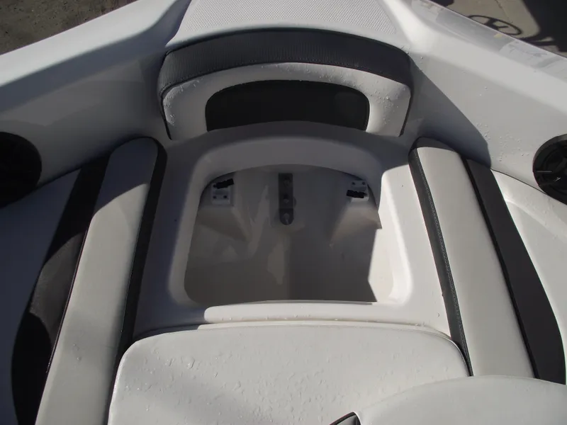 Slide: The Image of 2021 Yamaha Boats AR195 interior seating with storage compartment. - 10