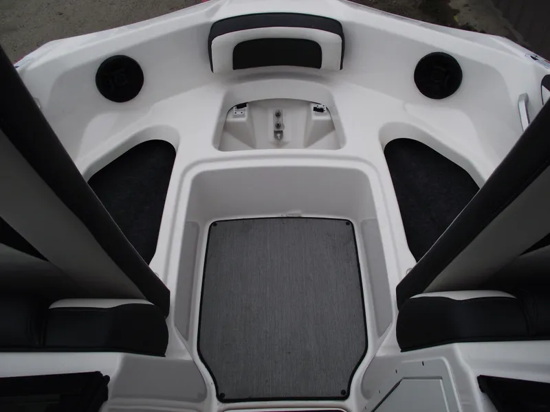 Slide: The Image of 2021 Yamaha Boats AR195 interior with seating and speakers. - 11