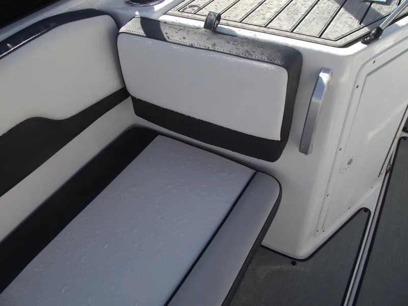 Slide: The Image of 2021 Yamaha Boats AR195 interior seating with sleek, modern design and comfortable upholstery. - 24