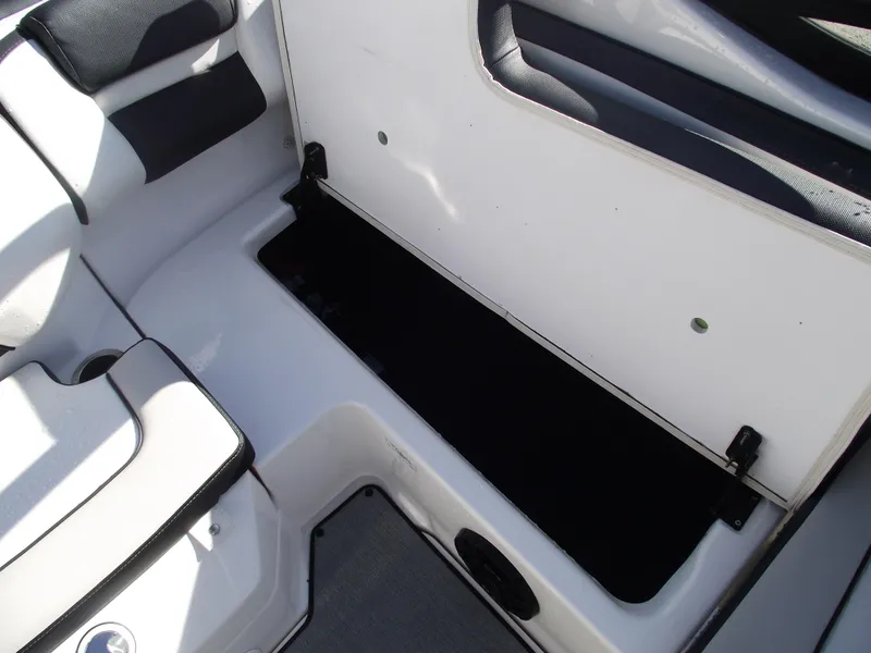 Slide: The Image of 2021 Yamaha AR195 boat interior storage compartment, open and spacious. - 29
