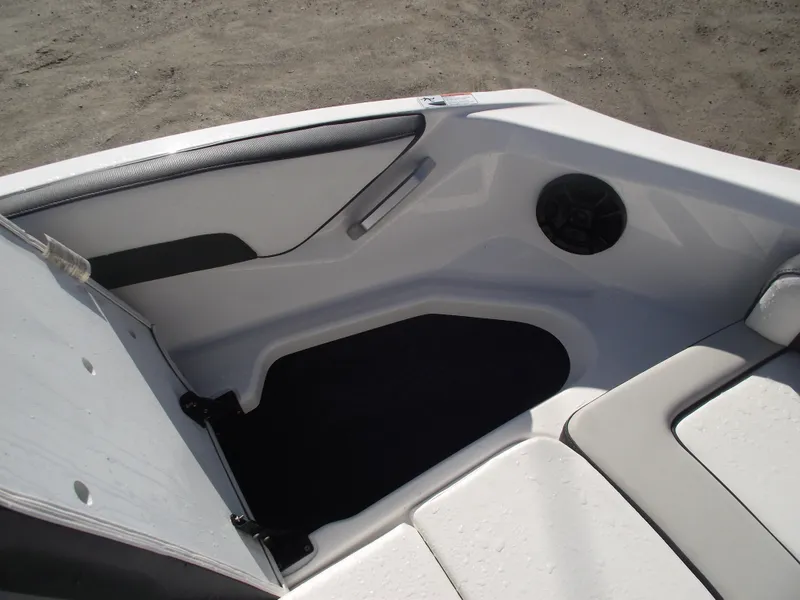 Slide: The Image of 2021 Yamaha AR195 boat interior with seating and speaker detail. - 6