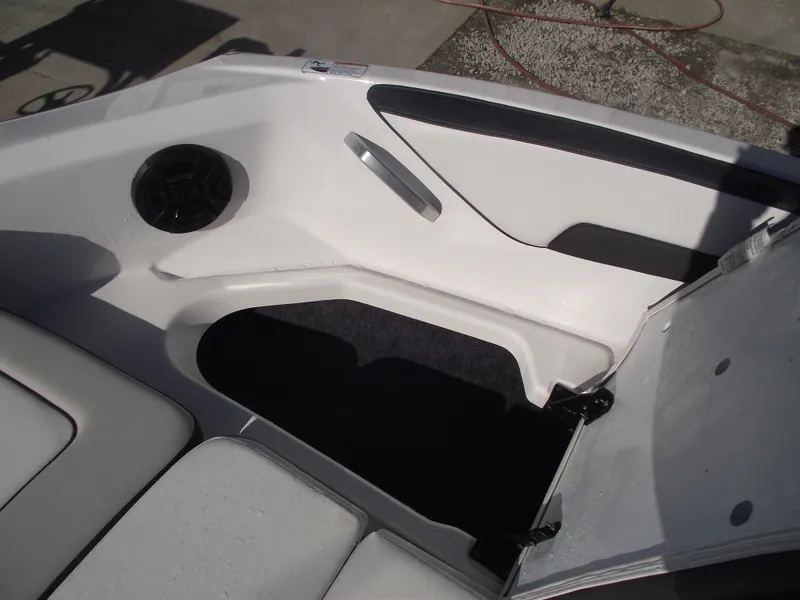 Slide: The Image of 2021 Yamaha AR195 boat interior with speaker and storage compartment. - 8