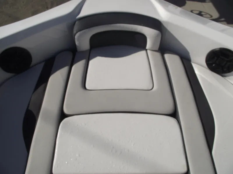 Slide: The Image of 2021 Yamaha Boats AR195 interior seating with cushioned layout. - 9