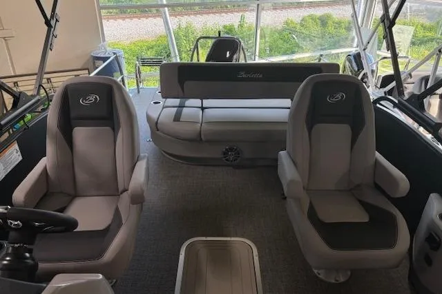 Slide: The Image of 2025 Barletta A22UC boat interior with plush seating and modern design. - 3