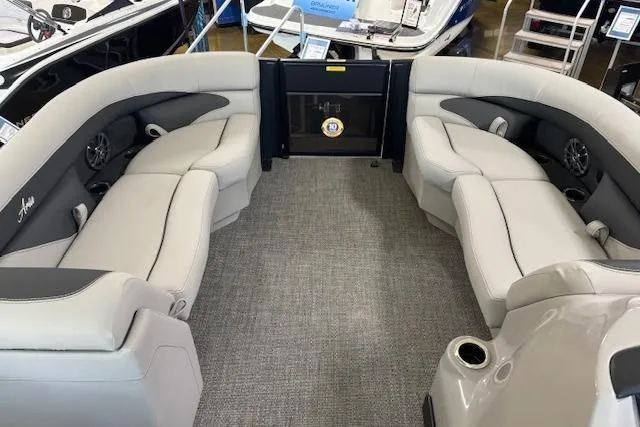 Slide: The Image of 2025 Barletta A22UC boat interior with luxurious seating and modern design. - 5