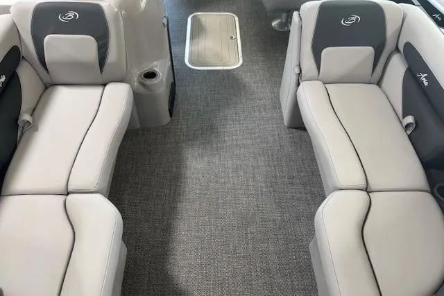 Slide: The Image of 2025 Barletta A22UC boat interior with gray seating and carpeted flooring. - 6