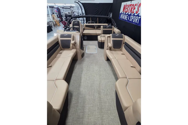 Slide: The Image of 2025 Barletta Cabrio 24U pontoon boat with outboard motor and rear deck view. - 2