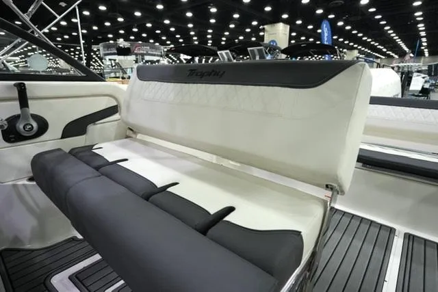 Slide: The Image of 2025 Bayliner T22SC boat interior with modern seating and sleek design. - 11