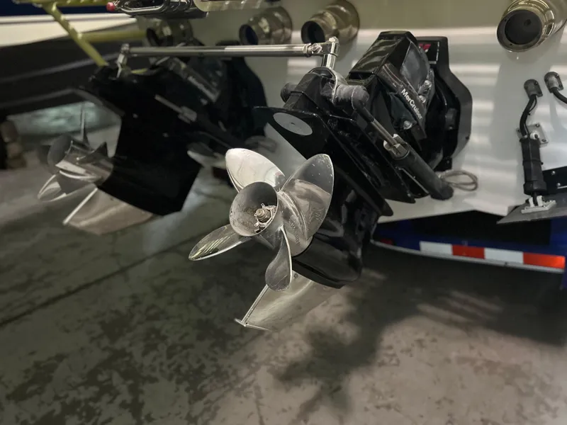 Slide: The Image of 2005 Baja 30 Outlaw boat propellers in a garage setting. - 10