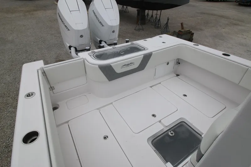 Slide: The Image of 2025 Invincible 33 Open Fisherman boat deck with twin Mercury engines. - 10