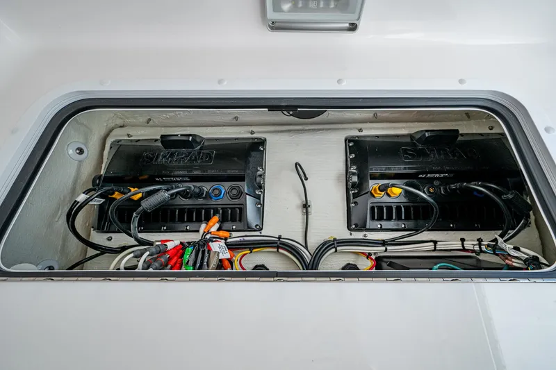 Slide: The Image of Electrical components inside 2025 Invincible 33 Open Fisherman boat. - 36