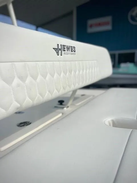 Slide: The Image of Trailer wheel of 2026 Hewes Redfisher 18 with Goodride tire on asphalt. - 7