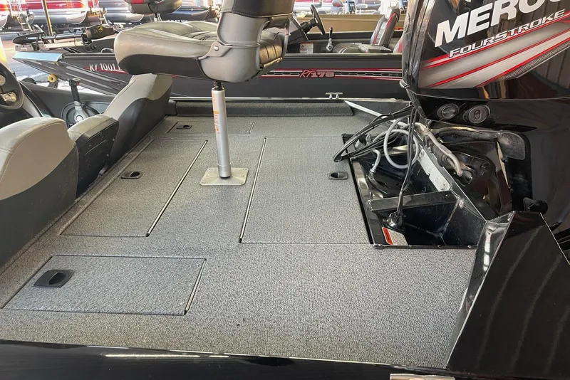 Slide: The Image of 2018 Tracker Pro Team 175TXW boat interior with Mercury FourStroke engine. - 5