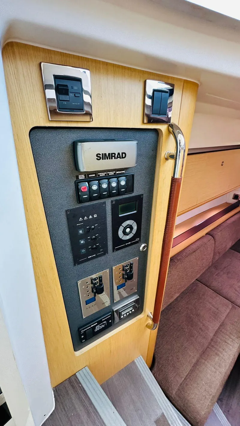 Slide: The Image of Control panel inside 2013 Beneteau Gran Turismo yacht with Simrad electronics. - 10