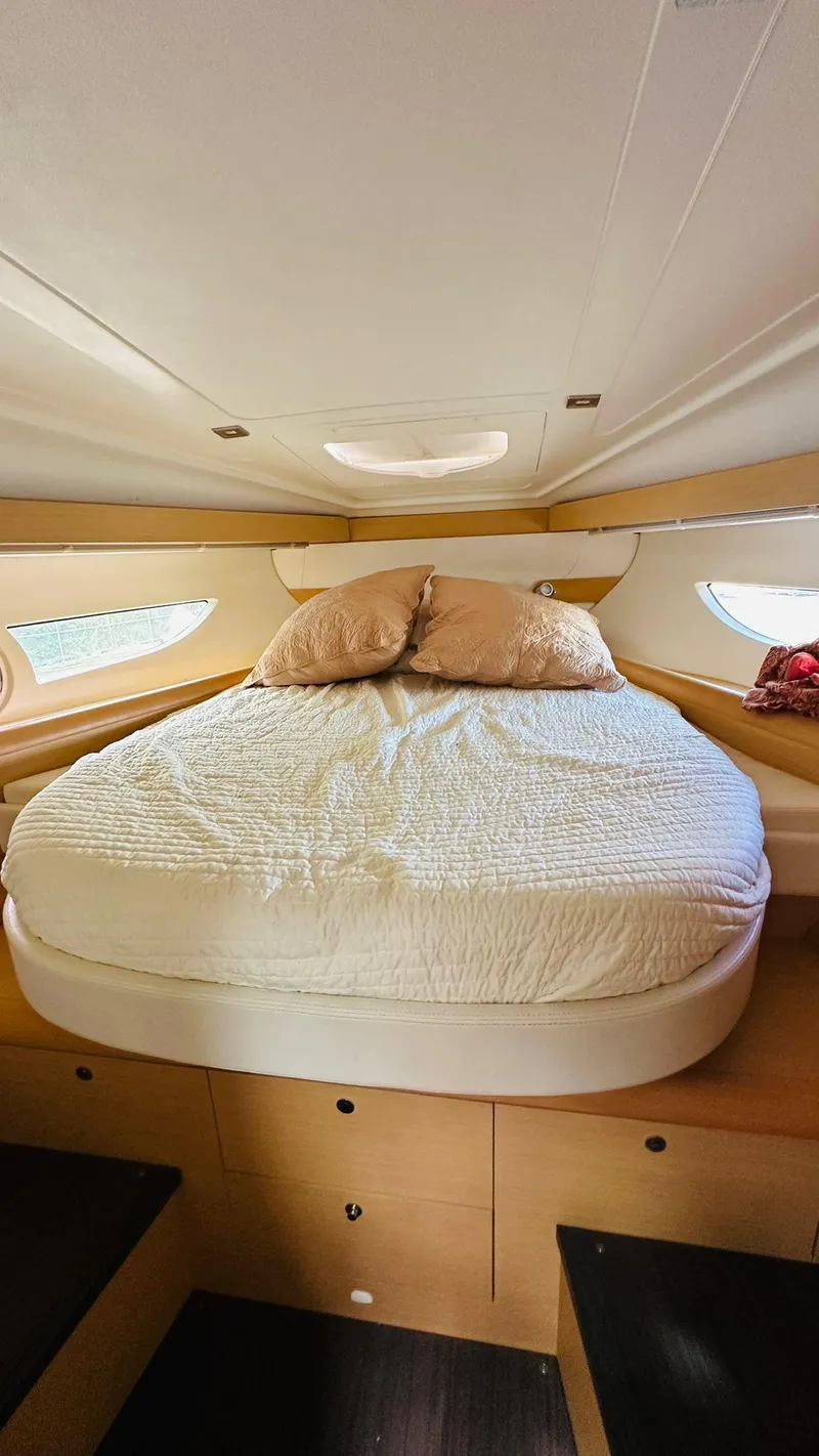 Slide: The Image of Luxurious cabin interior of 2013 Beneteau Gran Turismo yacht with cozy bed and elegant design. - 16