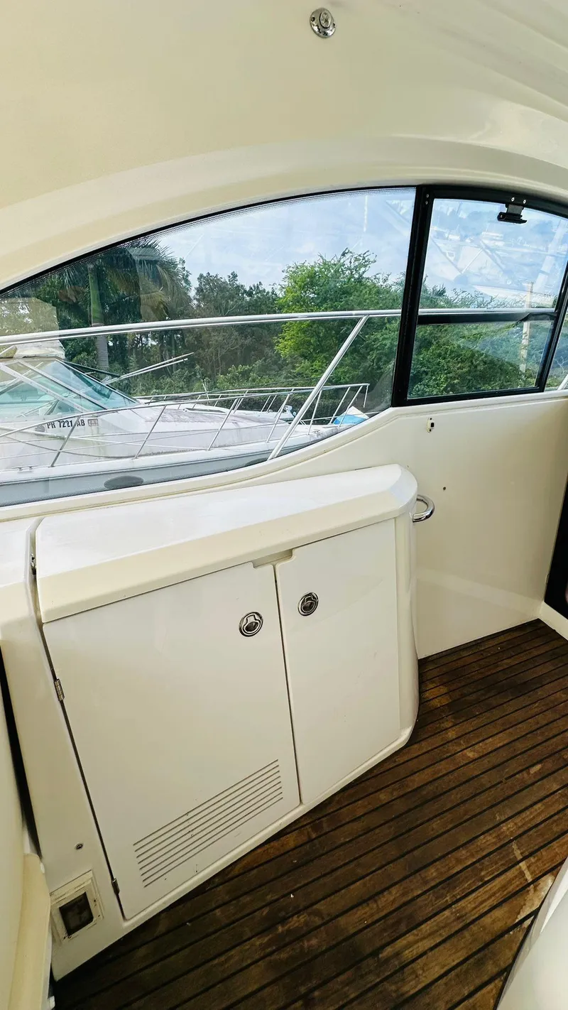 Slide: The Image of 2013 Beneteau Gran Turismo yacht interior with wooden flooring and large window view. - 7