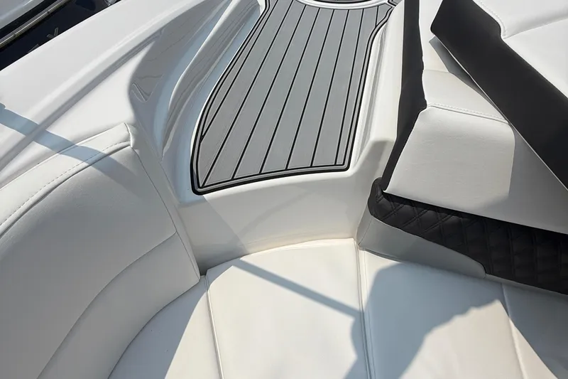 Slide: The Image of Interior of 2025 Monterey 224FS boat with sleek seating and stylish flooring. - 12