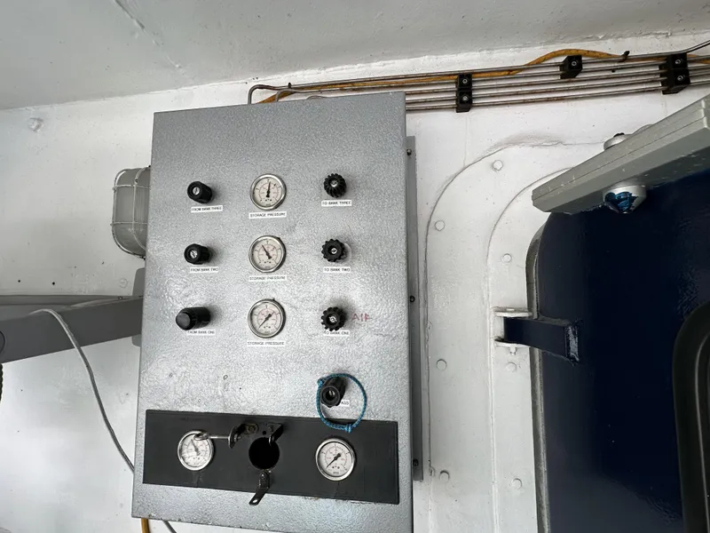 Slide: The Image of Control panel with gauges and knobs on a 1965 Custom Dive Boat. - 10