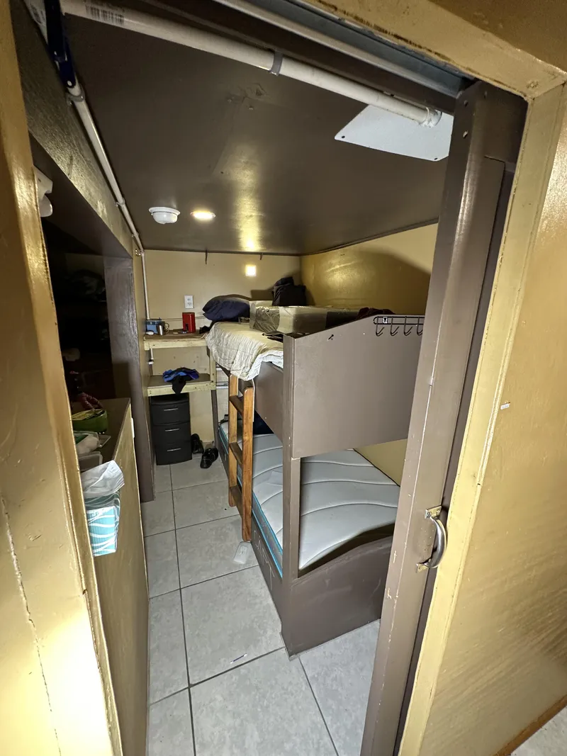 Slide: The Image of Small cabin with bunk beds on a 1965 custom dive boat. - 21