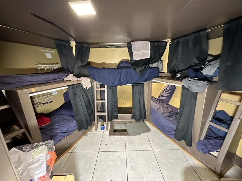 Slide: The Image of Compact cabin with bunk beds on a 1965 custom dive boat. - 23