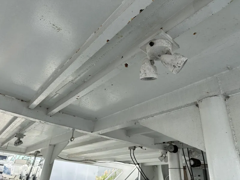 Slide: The Image of Interior view of a 1965 custom dive boat ceiling with lighting fixtures. - 3