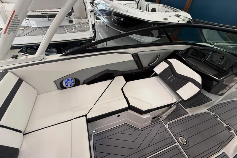 Slide: The Image of 2025 Monterey 235SS Super Sport boat interior with sleek seating and modern design. - 10