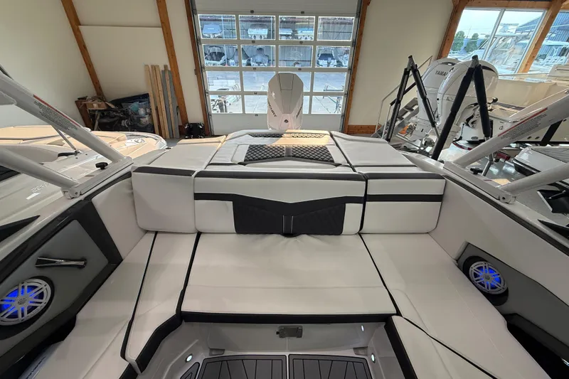 Slide: The Image of 2025 Monterey 235SS Super Sport boat interior with sleek seating and modern design. - 13