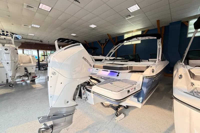 Slide: The Image of 2025 Monterey 235SS Super Sport boat with Mercury engine in showroom. - 7