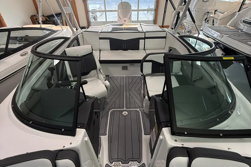 Slide: The Image of 2025 Monterey 235SS Super Sport boat interior with sleek seating and modern design. - 8