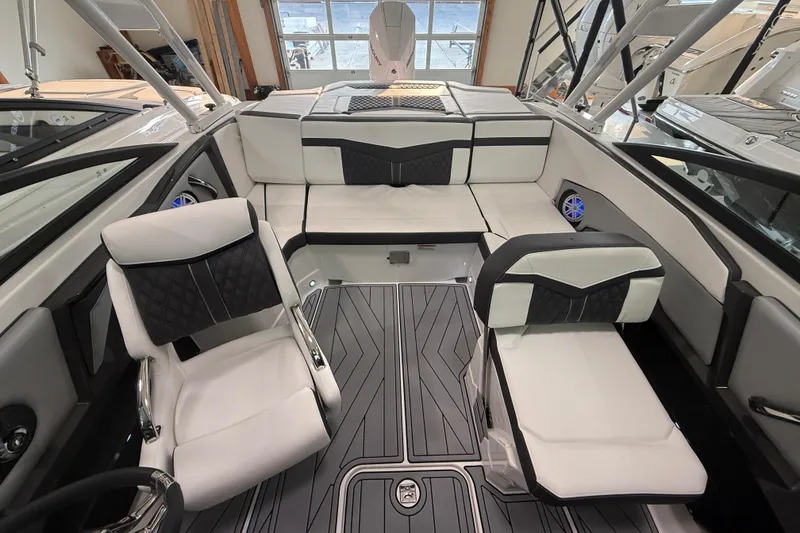 Slide: The Image of 2025 Monterey 235SS Super Sport boat interior with modern seating and sleek design. - 9