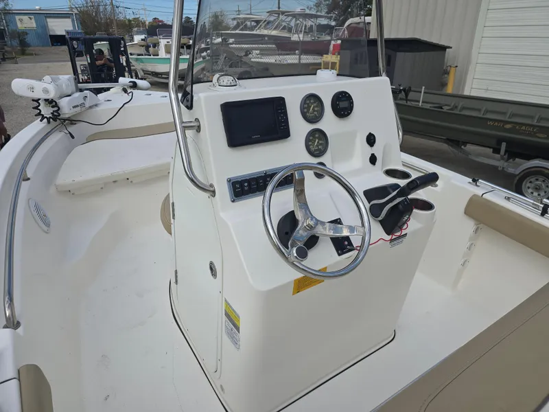 Slide: The Image of 2020 Key West 189 FS boat console with steering wheel and gauges. - 7