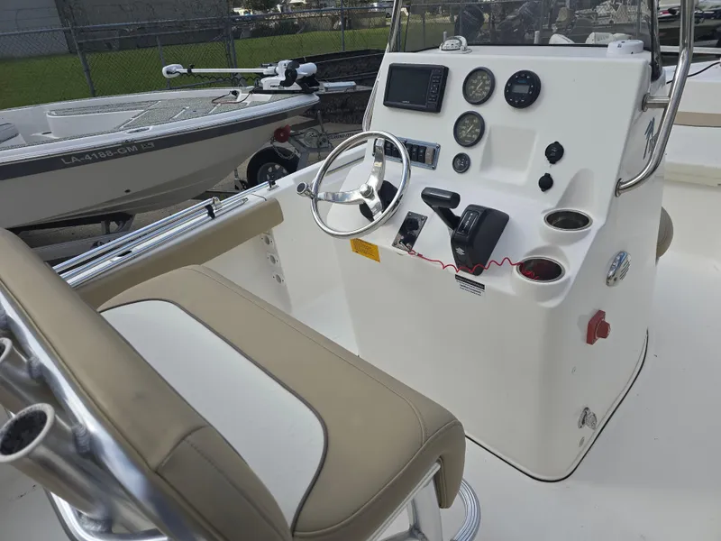 Slide: The Image of 2020 Key West 189 FS boat console with steering wheel and gauges. - 8