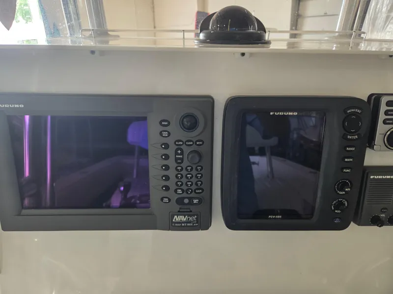 Slide: The Image of Dashboard of 2008 Contender 33 Tournament with Furuno navigation displays. - 15