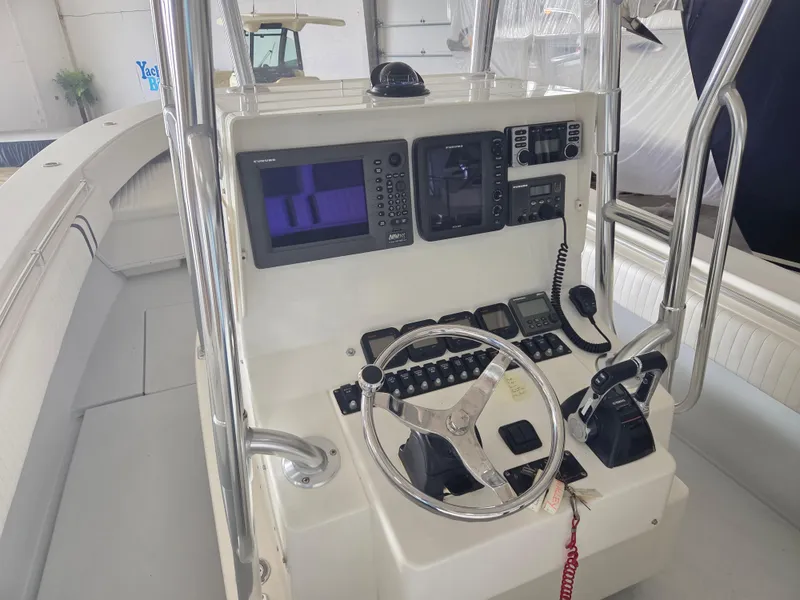 Slide: The Image of 2008 Contender 33 Tournament boat console with navigation and control systems. - 5