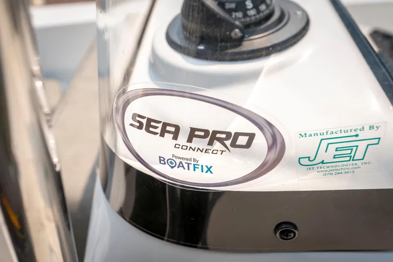 Slide: The Image of 2025 Sea Pro 202 Center Console dashboard with Sea Pro Connect and BoatFix logos. - 11