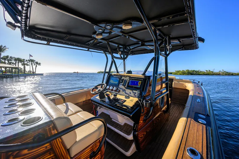 Slide: The Image of 2005 Midnight Express 39S Open boat interior with scenic water view. - 31