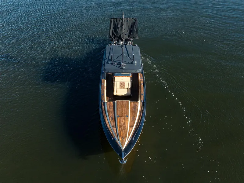 Slide: The Image of 2005 Midnight Express 39S Open boat on water, aerial view. - 43