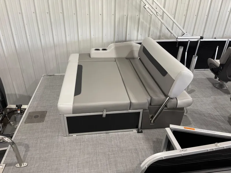 Slide: The Image of 2025 Princecraft Vectra 25 RL pontoon boat interior with gray seating and modern design. - 4